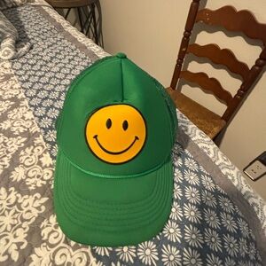 Green Cap with Yellow Smiley Face